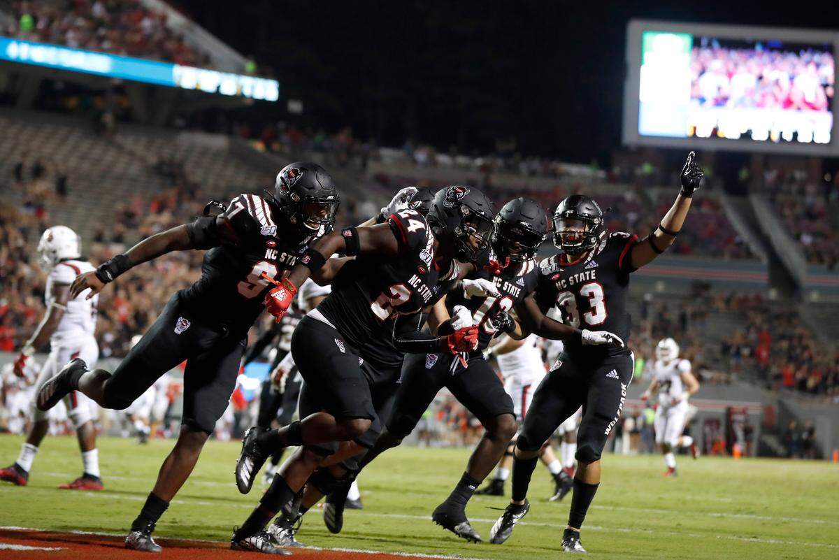 N.C. State’s Malik Dunlap (24) celebrates with teammates after recovering a blocked punt during the second half of N.C. State’s 34-23 victory over Ball State at Carter-Finley Stadium in Raleigh, N.C. Saturday, Sept. 21, 2019.