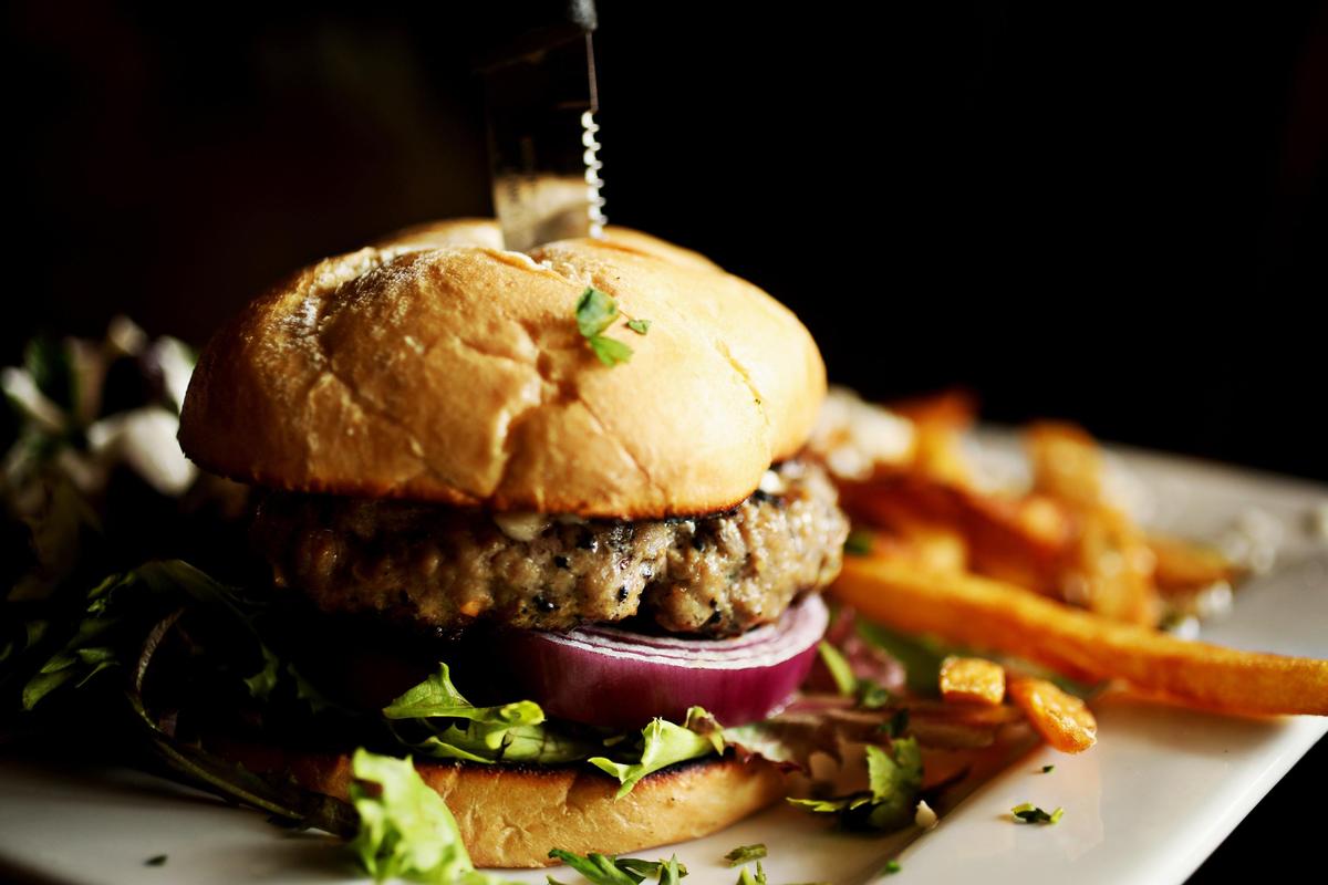 Sophie’s Grill & Bar in Cary serves My Big Fat lamb burger made with ground fresh, grilled to order, and topped with melted feta and a side of Sophie’s exemplary classic cut fries.