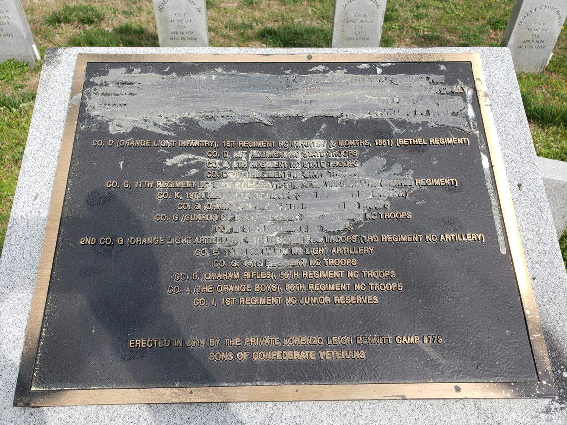 A Durham confederate monument in the city of Durham’s Maplewood Cemetery was recently vandalized. Here it sits on Sunday, April 7, 2019, with what appears to be cement smeared on the memorial’s bronze plaque that remembered Orange and Durham Confederate companies.