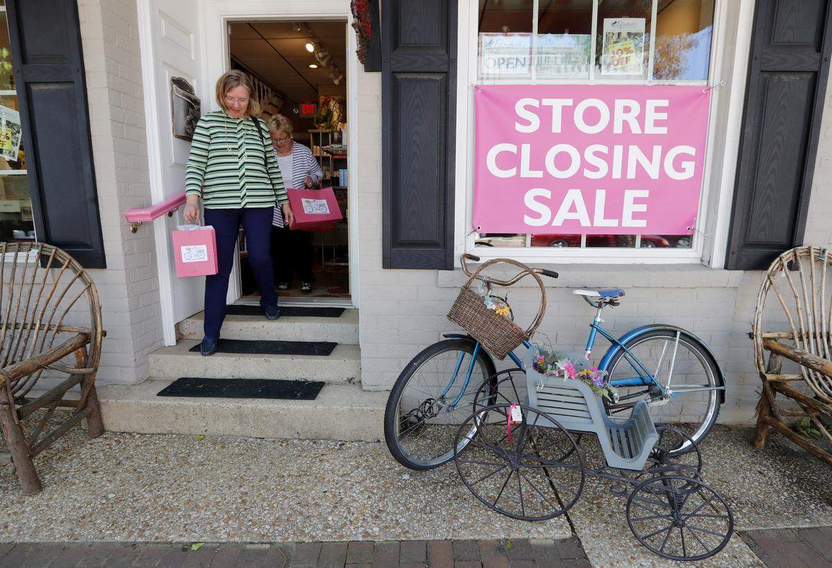 Jane Diepenbrock, left, and Gertrude Oldfield, leave after shopping at Elizabeth's Home & Garden Shop in Cary Wednesday, May 9, 2018.