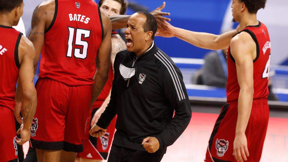N.C. State head coach Kevin Keatts is pumped by the play of his team late in the first half of N.C. State’s game against Syracuse in the second round of the ACC Men’s Basketball Tournament in Greensboro, N.C., Wednesday, March 10, 2021.