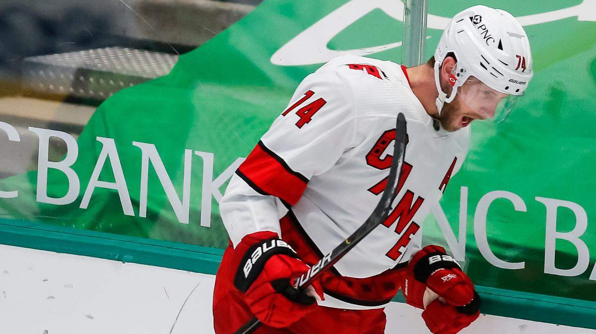 Carolina Hurricanes defenseman Jaccob Slavin (74) celebrates after scoring a goal in April. Slavin is questionable for Monday’s Game 1 between the Hurricanes and Nashville Predators.