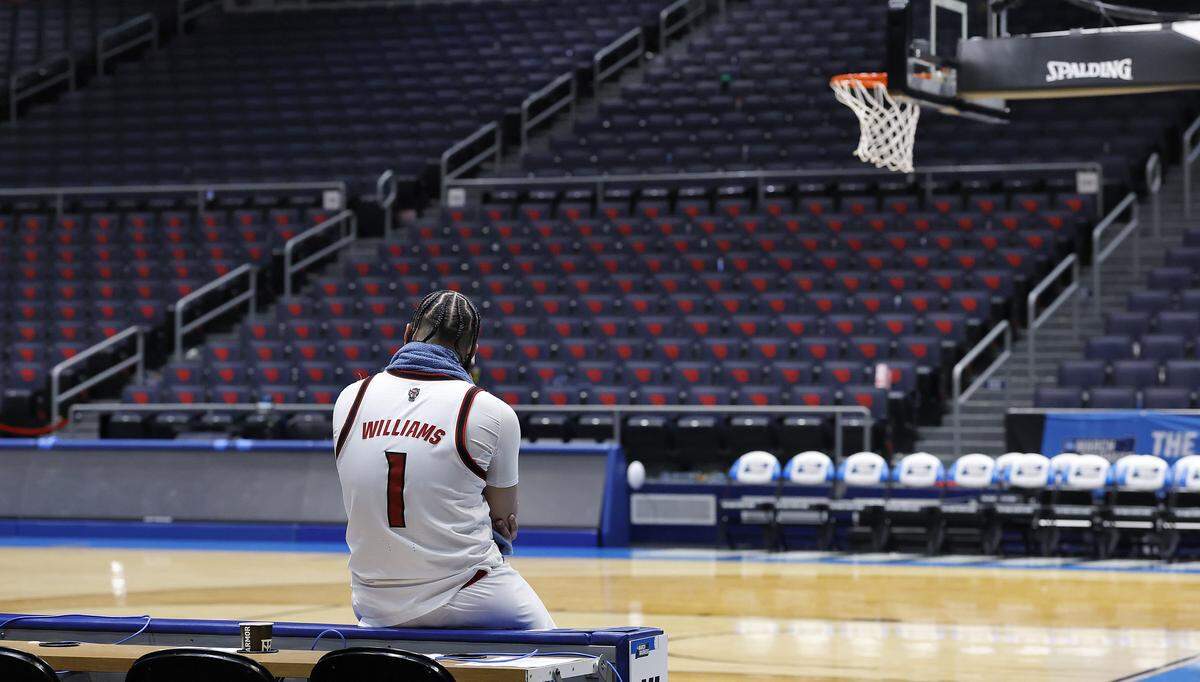 N.C. State’s Darrion Williams sits in an empty University of Dayton Arena following the Wolfpack’s 68-66 loss to Texas in the NCAA First Four on Tuesday, March 17, 2026, at the in Dayton, Ohio.