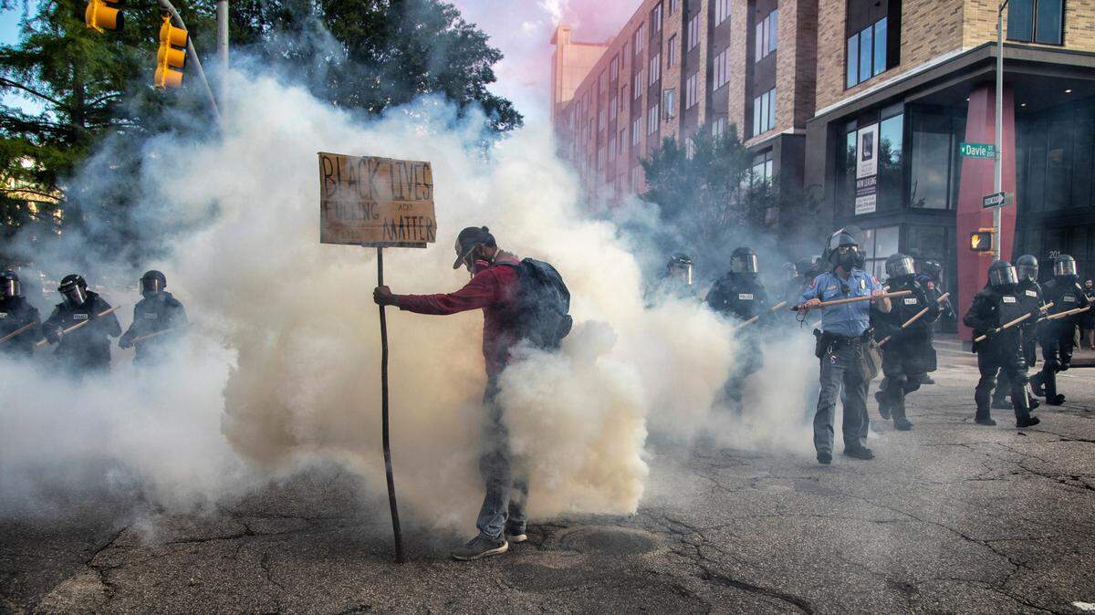 Protesters, police clash at Raleigh protest of Floyd’s death; buildings damaged, looted