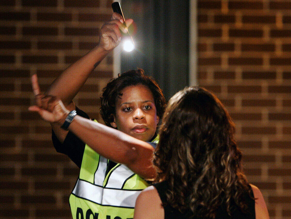 A 2007 photo shows Cary Police Officer K. Christian performing field sobriety tests on a motorist during a checking station checkpoint with an emphasis on DWI enforcement at the intersection of E. Chatham St. and Travis Park Drive in Cary.