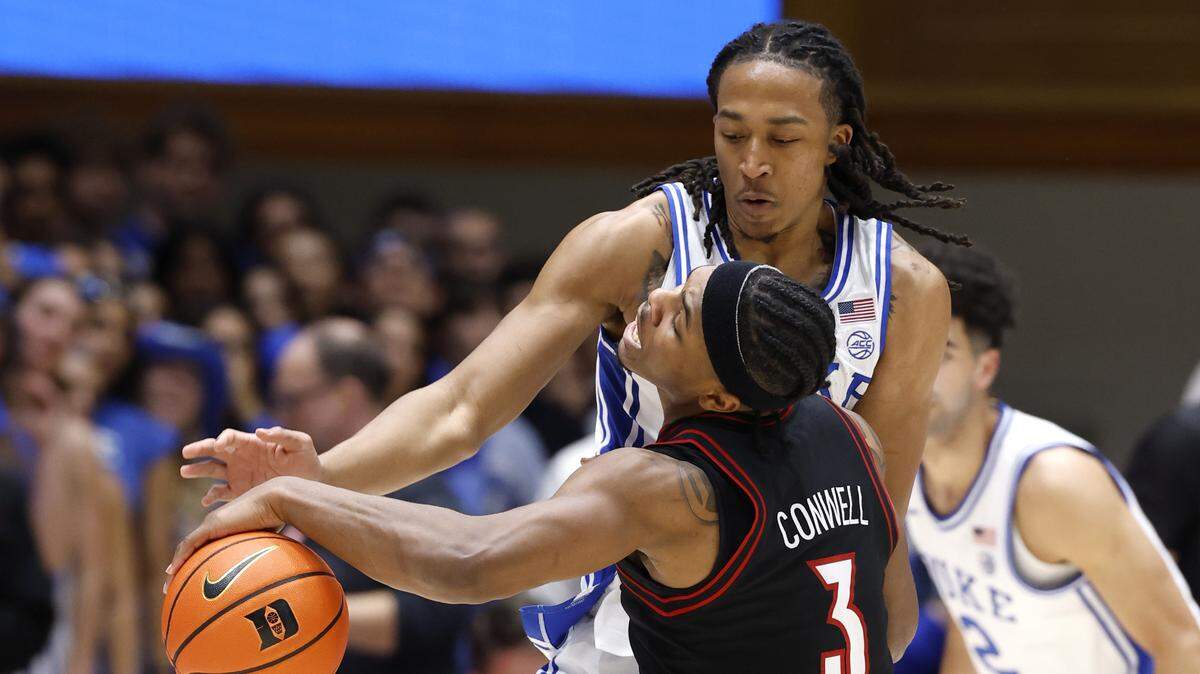 Duke’s Maliq Brown (6) defends Louisville's Ryan Conwell (3) during the second half of Duke’s 83-52 victory over Louisville at Cameron Indoor Stadium in Durham, N.C., Monday, Jan. 26, 2026.