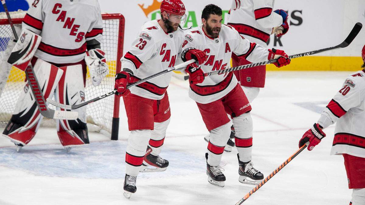 The Carolina Hurricanes Stefan Noesen (23) and Jordan Martinook (48) take part in the pre-game skate ahead of Game 3 of the Eastern Conference Finals against the Florida Panthers on Monday, May 22, 2023 at FLA Live Arena in Sunrise, Fla.