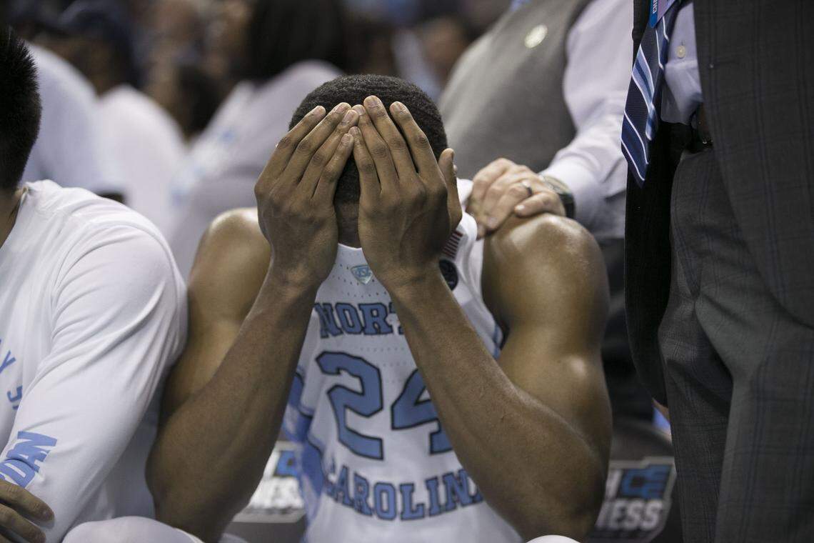 North Carolina's Kenny Williams (24) reacts after coming out of the game in the closing minute during North Carolina's loss to Texas A&M.