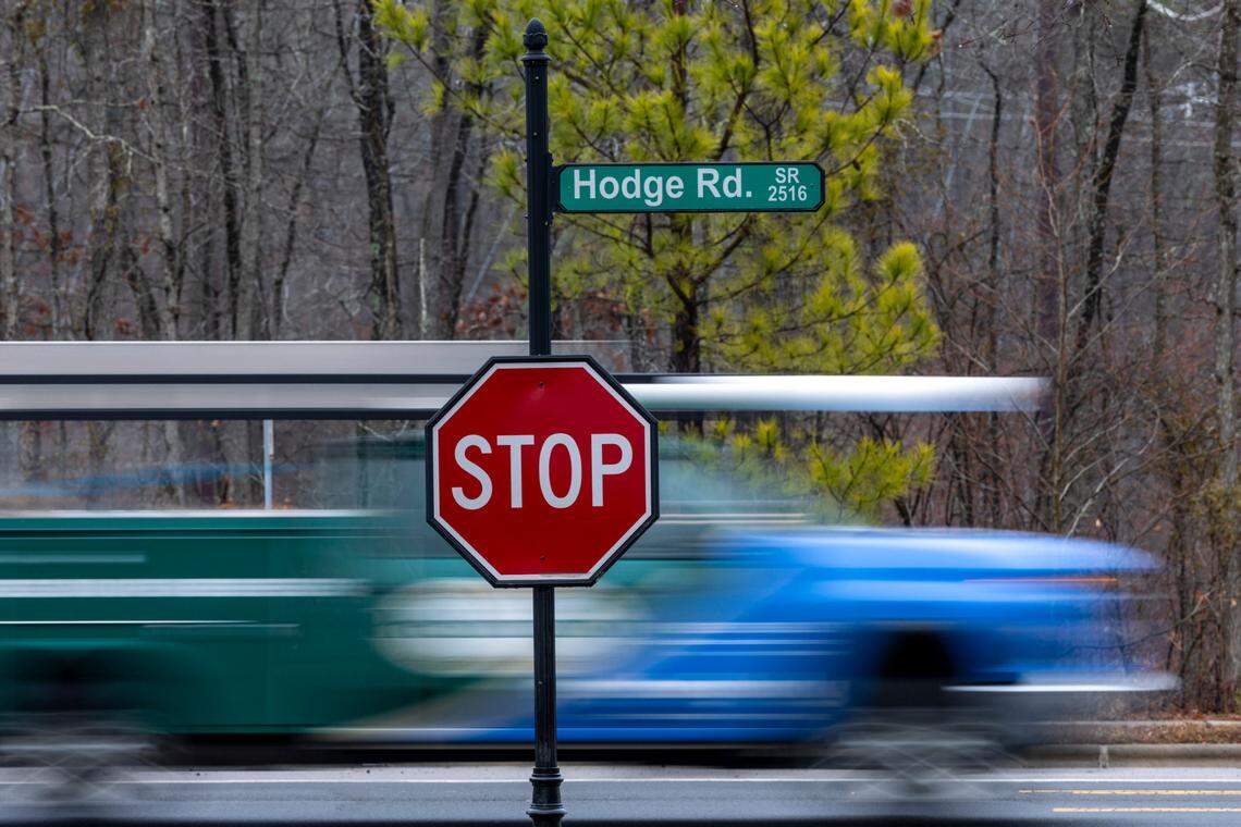 Traffic passes an entrance to the Princeton Manor neighborhood in Knightdale, N.C. Flock Safety cameras are installed at both entrances to the neighborhood off of Hodge Road.