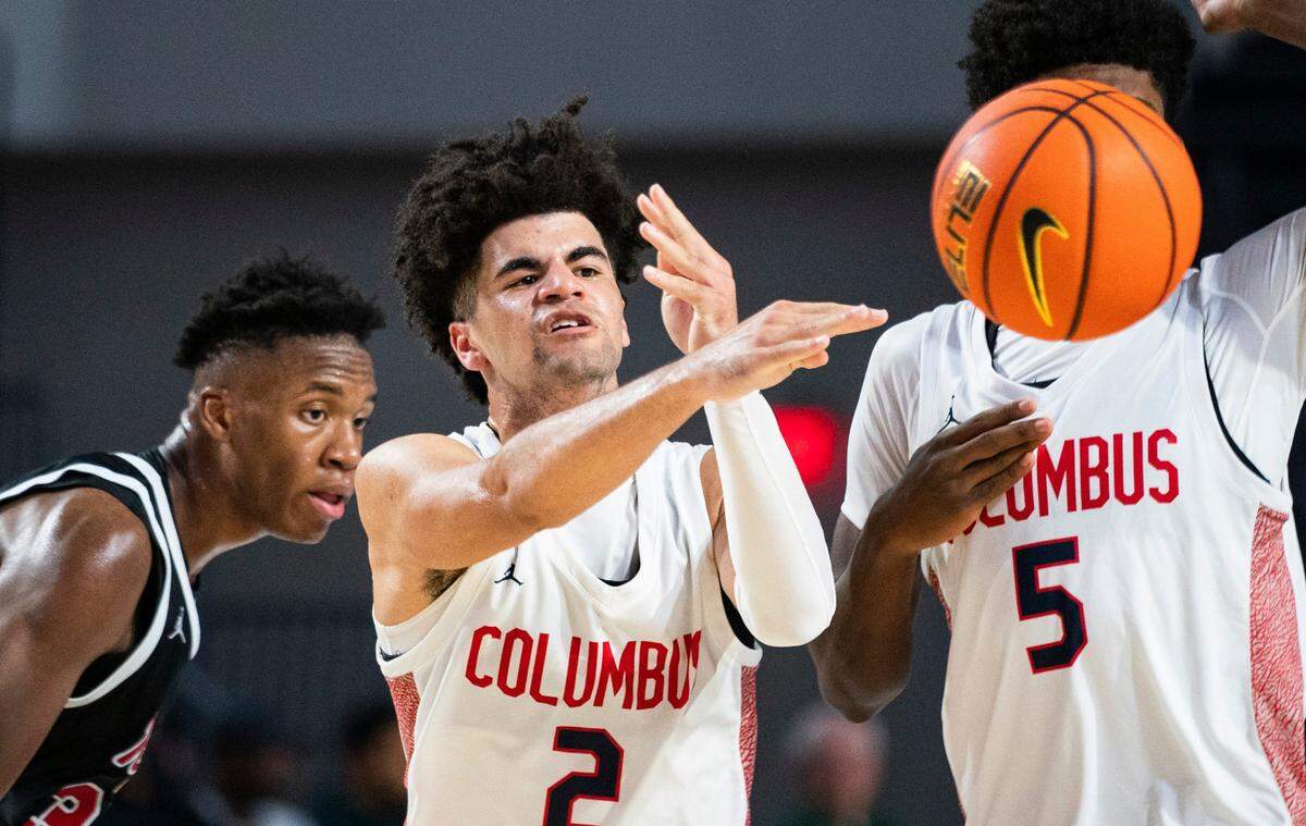 Columbus Explorers guard Cayden Boozer (2) passes the ball during their game against the Archbishop Ryan Raiders in the 50th annual City of Palms Classic at Suncoast Credit Union Arena in Fort Myers in December 2023.