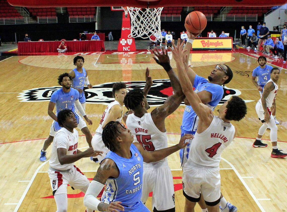 North Carolina’s Garrison Brooks (15) shoots during N.C. State’s 79-76 victory over UNC at PNC Arena in Raleigh, N.C., Tuesday, December 22, 2020.