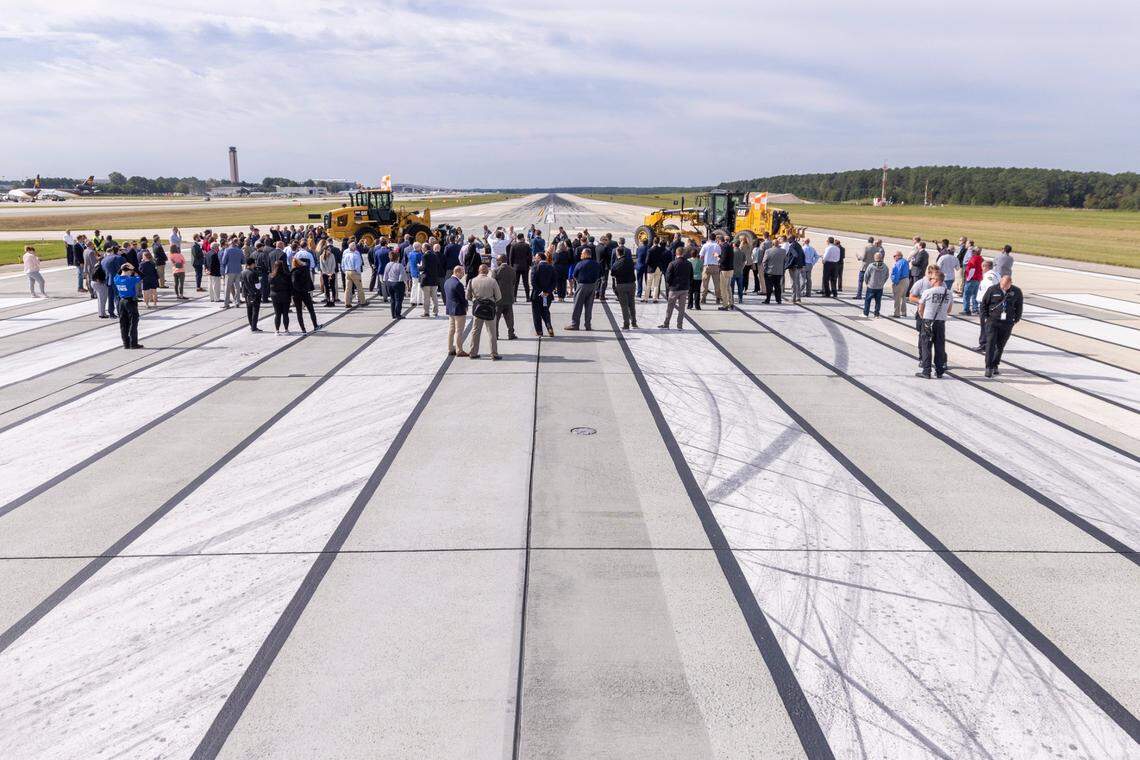 More than 200 politicians and business and community leaders take part in a groundbreaking ceremony on runway 5L/23R at RDU International Airport in Morrisville, Wednesday, Oct. 11, 2023. A new, longer 5L/23R, will be built northwest and parallel to the existing runway near Terminal 2.