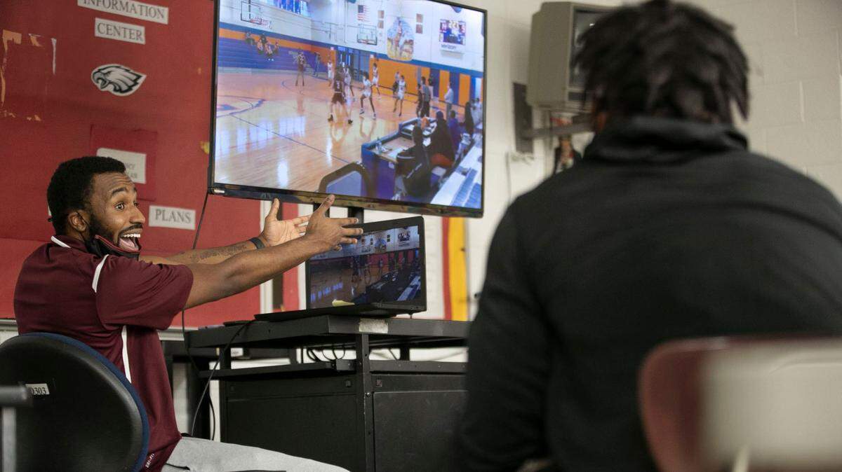 Warren County High School coach Toriano McRae Jr. goes over video of the team’s previous game as they prepare to play Webb High School on Friday, January 29, 2021 in Warrenton, N.C.
