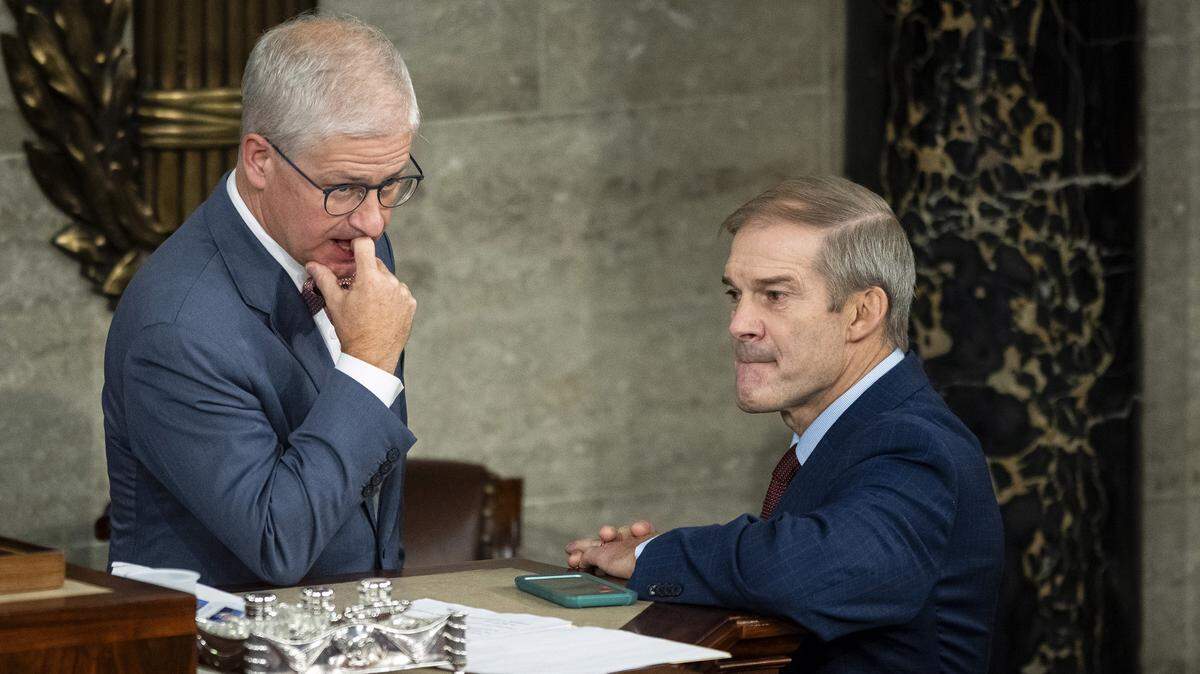 Rep. Patrick McHenry (R-N.C.) speaks with Rep. Jim Jordan (R-Ohio) before a second round of voting for Speaker of the House on Wednesday, October 18, 2023. Jordan lost that vote and a third on Friday and later withdrew his bid as speaker. McHenry, who is Interim House Speaker, said House Republicans will return Monday to start the process again.