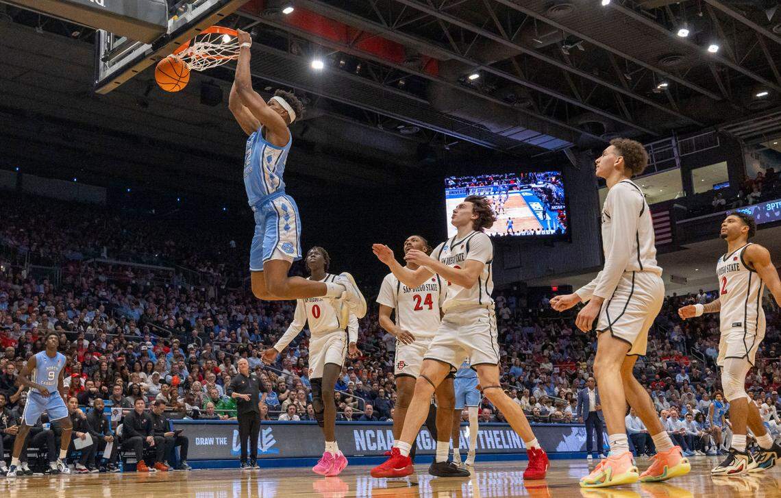 North Carolina forward Ven-Allen Lubin (22) breaks to the basket for two of his 12 points ahead of the entire San Diego State team on a fast break in the first half during the NCAA First Four on Tuesday, March 18, 2025 at the University of Dayton Arena in Dayton, Ohio.