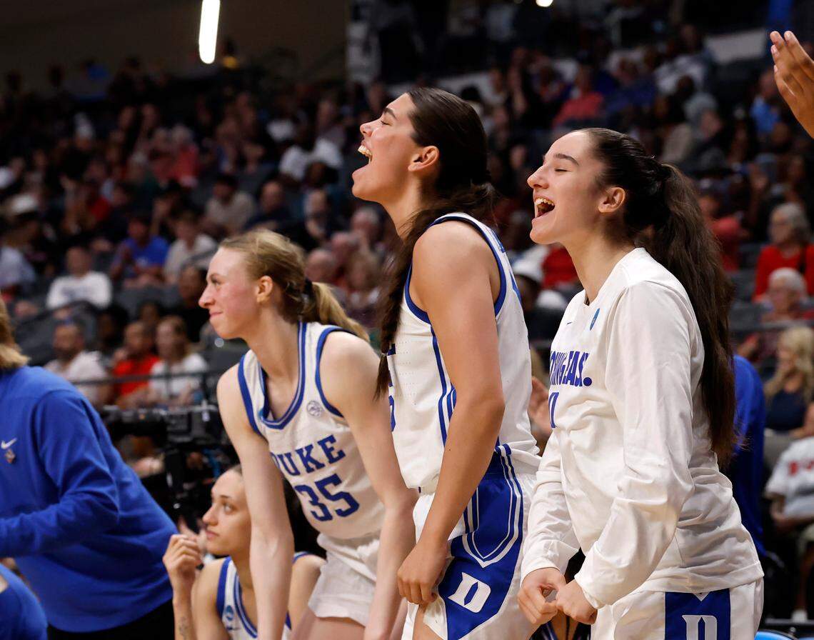 Duke’s Toby Fournier, Emma Koabel and Louann Battiston react on the bench during the second half of the Blue Devils’ 47-38 win over North Carolina in the Birmingham Regional of the NCAA Tournament at Legacy Arena on Friday, March 28, 2025 in Birmingham, Ala.