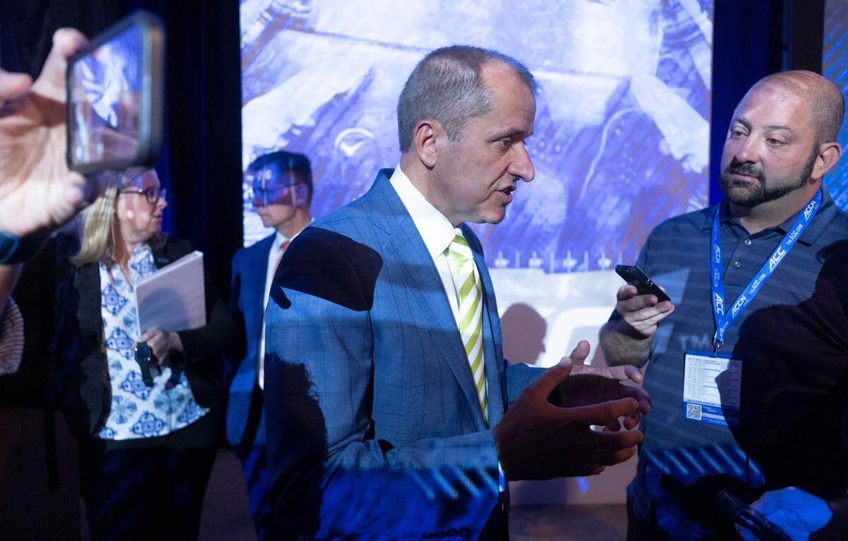 ACC Commissioner Jim Phillips talks with reporters following his Commissioner’s Forum in the Westin grand ballroom during the 2022 ACC Football Kickoff on Wednesday, July 20, 2022 in Charlotte, N.C.