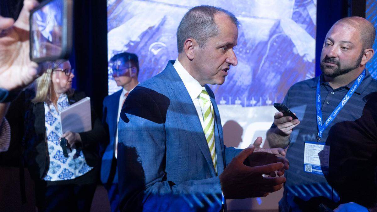 ACC Commissioner Jim Phillips talks with reporters following his Commissioner’s Forum in the Westin grand ballroom during the 2022 ACC Football Kickoff on Wednesday, July 20, 2022 in Charlotte, N.C.
