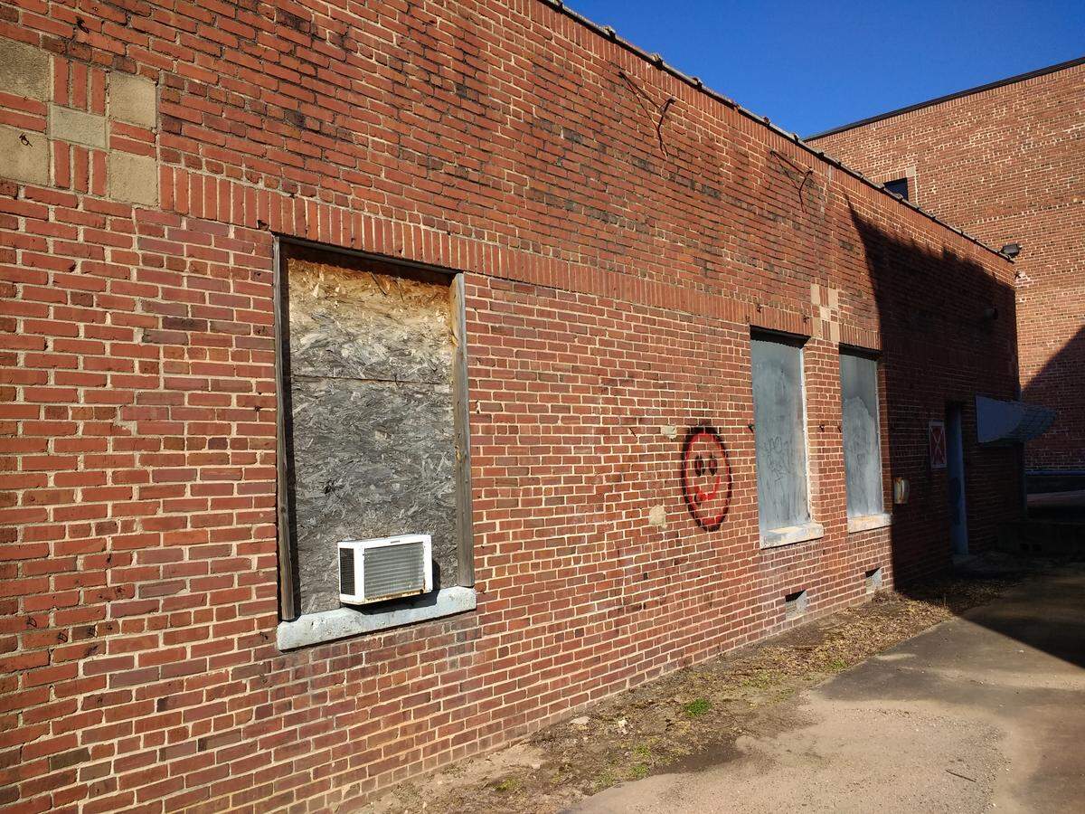 State government will soon demolish three run-down buildings along Dawson Street in downtown Raleigh, including the “Old Film Library.” The demolition was approved by the Council of State in March 2019.