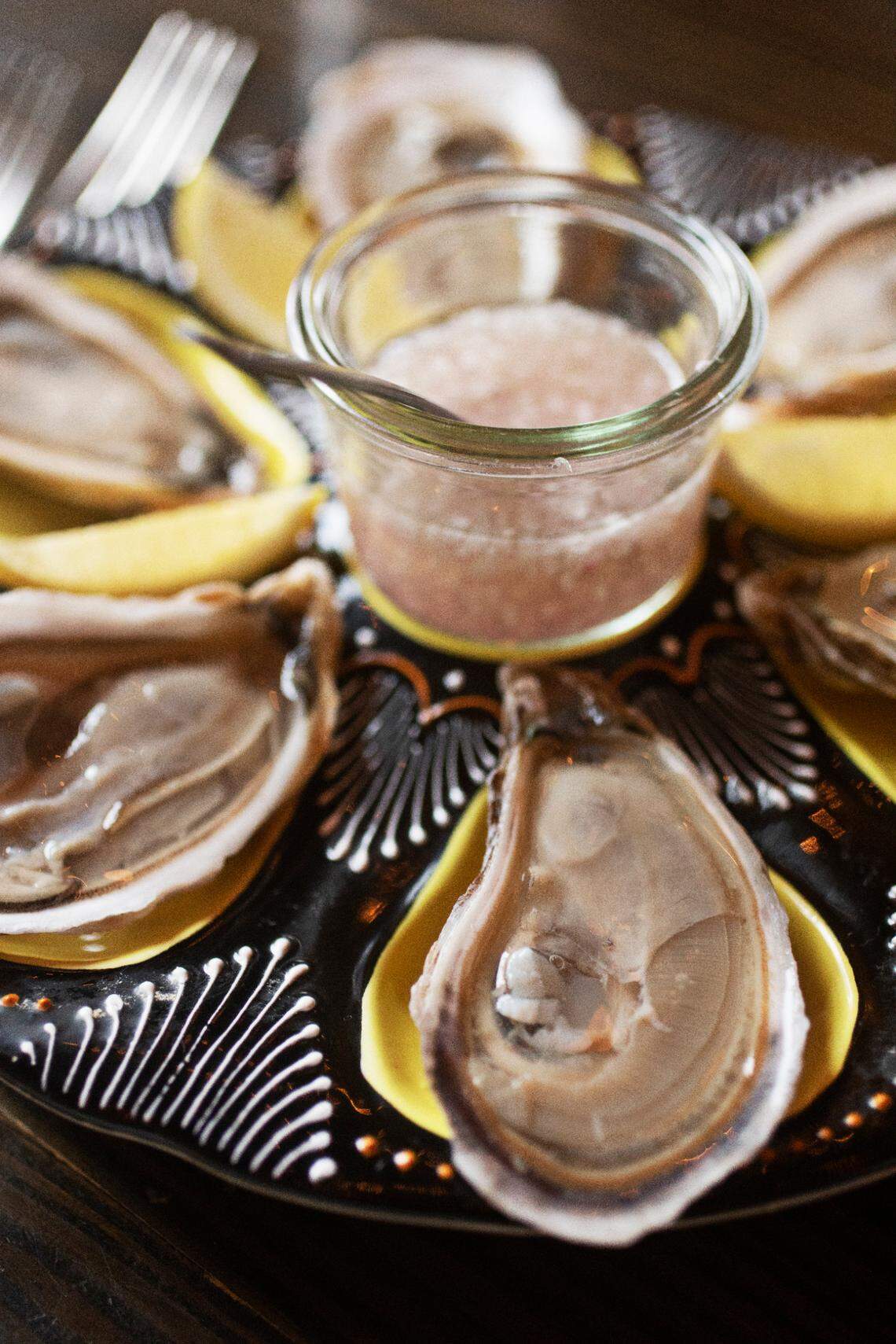 A 1/2 dozen oysters served with classic mignonette at Littler in Durham on Thursday, Feb. 24, 2022.