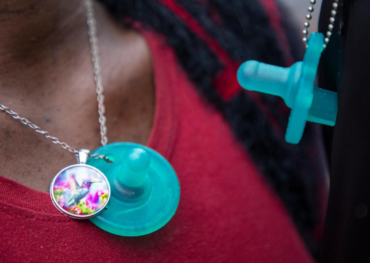 Brittany Brown, 28, left, and Damaris Burnette, 27, stand for a portrait on Friday, Jan. 3, 2020, outside their apartment at McDougald Terrace, the largest public housing community in Durham, N.C., where they believe their infant son Britain Brown died of carbon monoxide poisoning on Dec. 8, 2019, soon after another infant in the community also died suddenly on Nov. 20, 2019. After the deaths and several other poisoning reports, housing officials conducted inspections of all units, held a community meeting, then ordered an evacuation of all residents to nearby hotels.