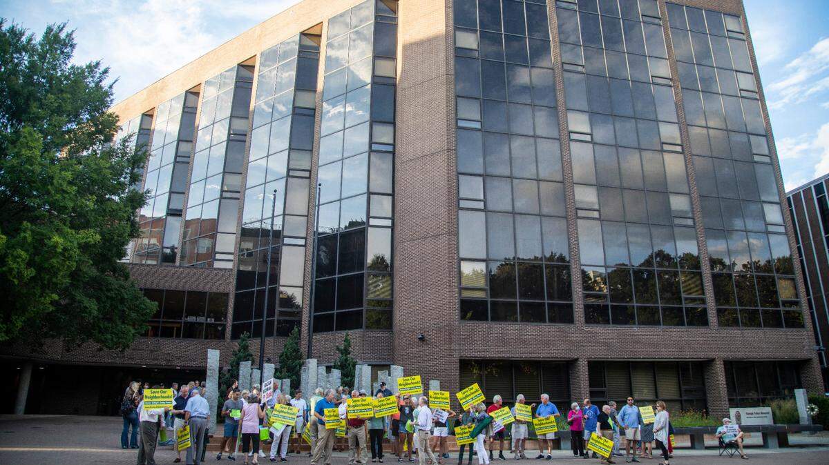 Demonstrators protest outside the Raleigh Municipal Building prior to a city council meeting Tuesday Sept. 6, 2022. Many of the demonstrators opposed recent amendments to Raleigh’s zoning ordinances.
