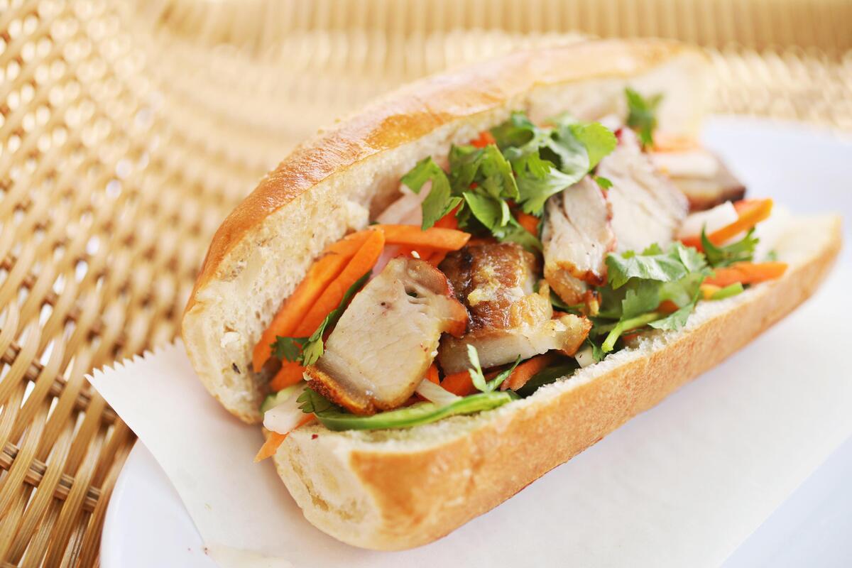 Pho XO in Morrisville serves a variety of the traditional banh mi, including the banh mi heo, shown here. The baguette, filling and garnish are all on point.