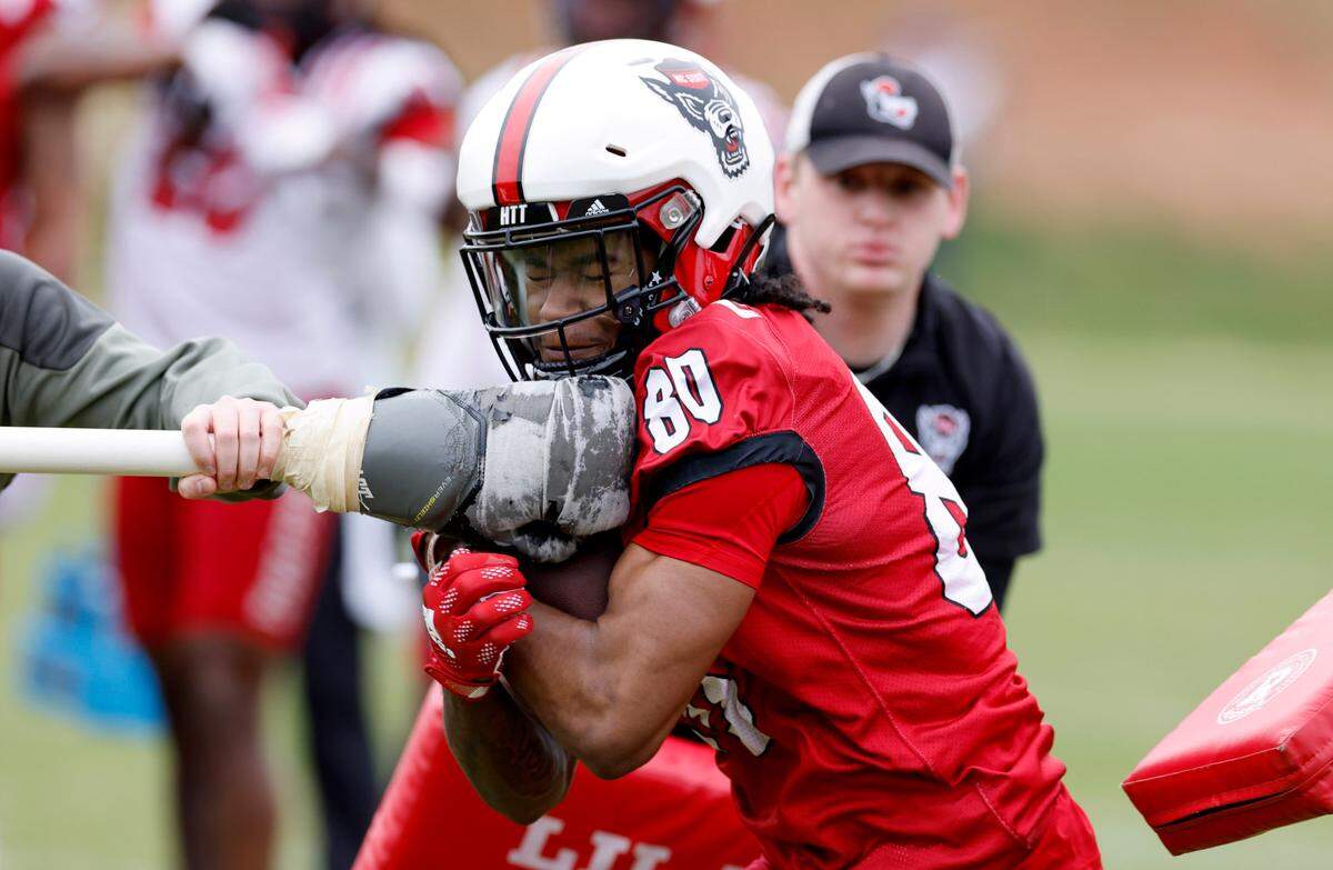 N.C. State wide receiver Kevin ‘KC’ Concepcion (80) runs drills during the Wolfpack’s first spring practice in Raleigh, N.C., Wednesday, March 1, 2023.