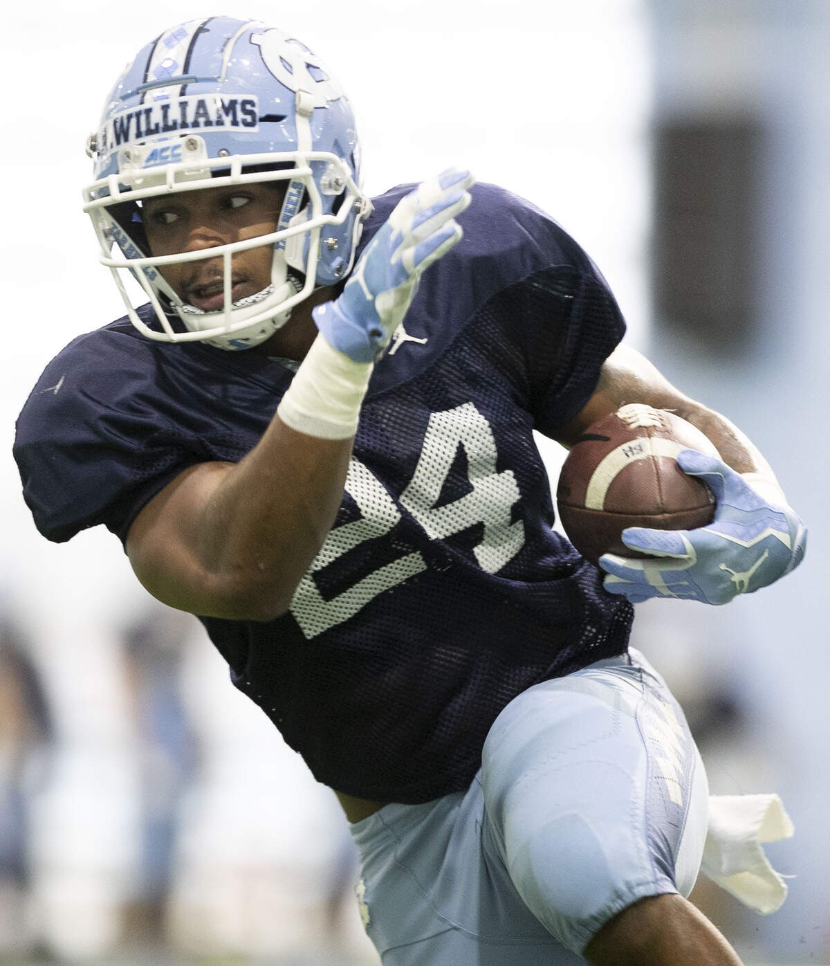 North Carolina tailback Antonio Williams (24) works out during the Tar Heels’ practice at their indoor practice facility on Tuesday, April 2, 2019 in Chapel Hill, N.C