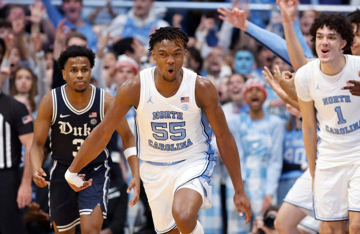 North Carolina’s Harrison Ingram (55) celebrates hitting a three-pointer during the second half of UNC’s 93-84 victory over Duke at the Smith Center in Chapel Hill, N.C., Saturday, Feb. 3, 2024.