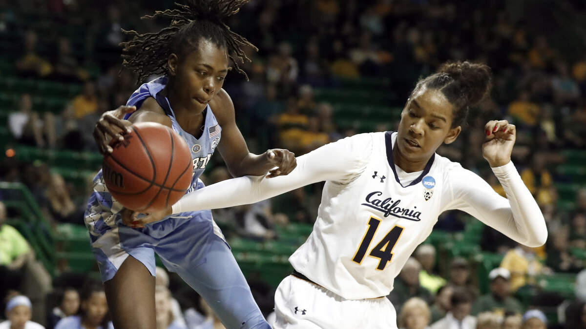 North Carolina guard Shayla Bennett (0) attempts to gain control of the ball in front of California’s Kianna Smith (14) in the second half of Cal’s first-round win in the NCAA tournament Saturday in Waco, Tex.