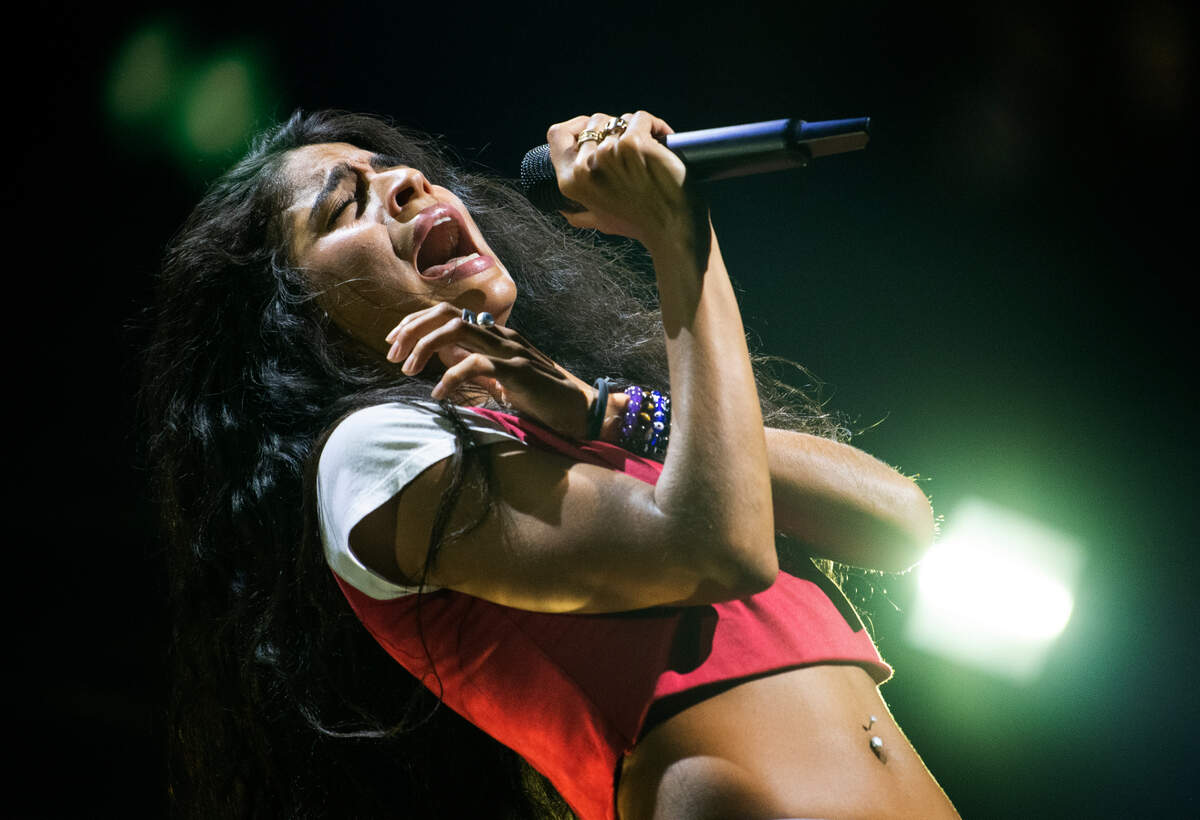Jessie Reyez opens for Sam Smith in concert on the “Gloria” tour, Tuesday night, Aug. 1, 2023 in Raleigh, N.C.