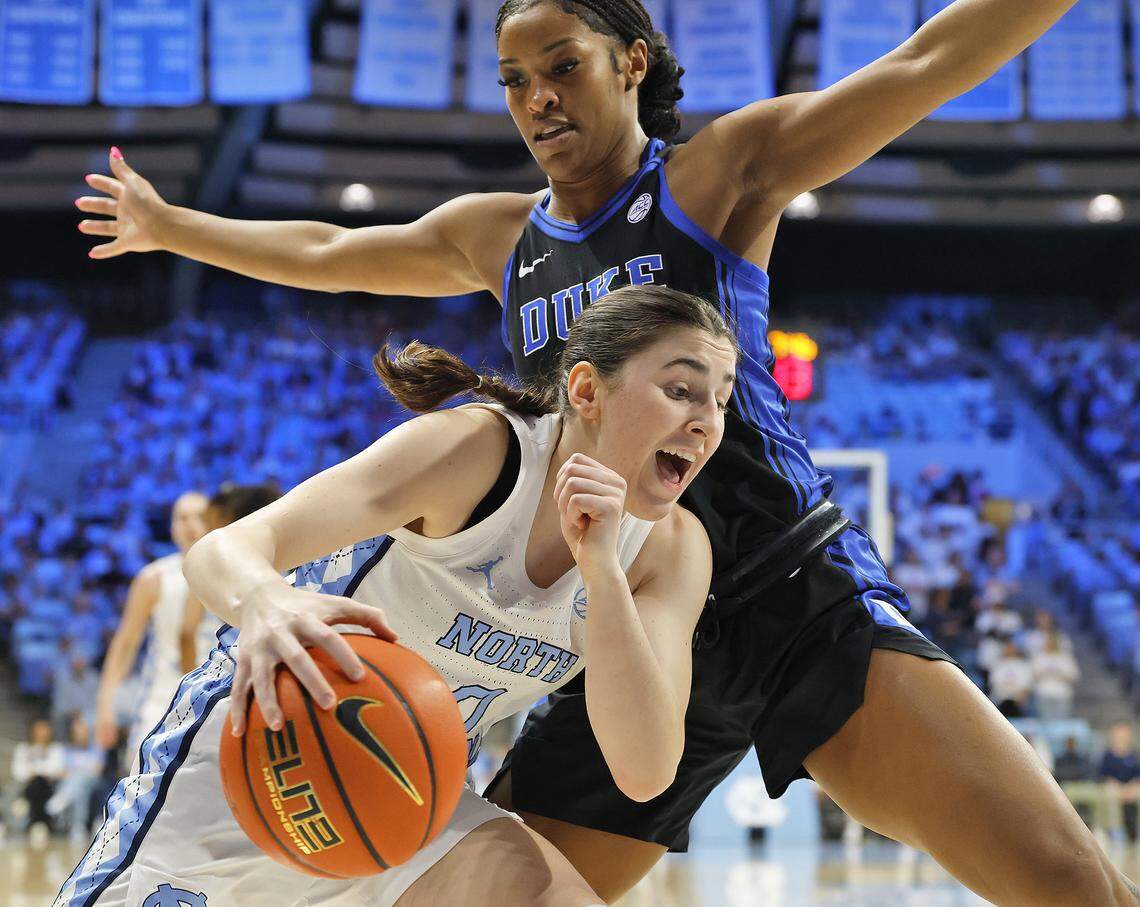 North Carolina’s Lanie Grant drives against Duke’s Ashlon Jackson during the first half of the Tar Heels’ game on Sunday, March 1, 2026, at Carmichael Arena in Chapel Hill, N.C. 