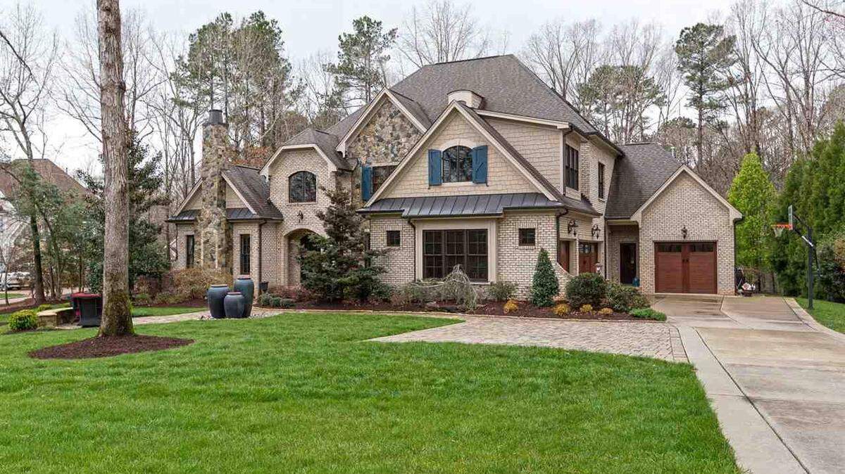 Located in the Wakefield Estates subdivision, this is a four-bedroom, 5,775-square-foot house with four bathrooms and two half bathrooms, a four-car garage, private elevator and a home theater. It is up for sale for $1.1 million and is near Falls Lake.
