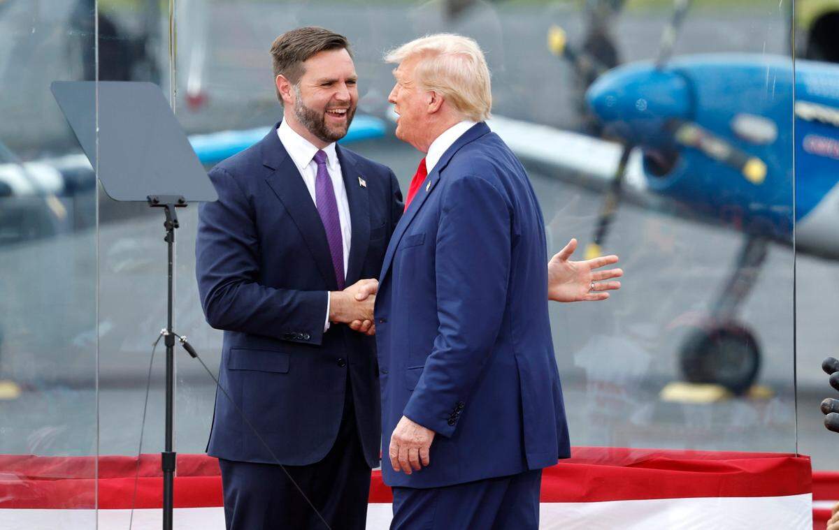 Sen. JD Vance and Republican candidate for vice president greets former President and current Republican candidate for president Donald Trump after Vance introduced him in Asheboro, N.C., Wednesday, August 21, 2024.