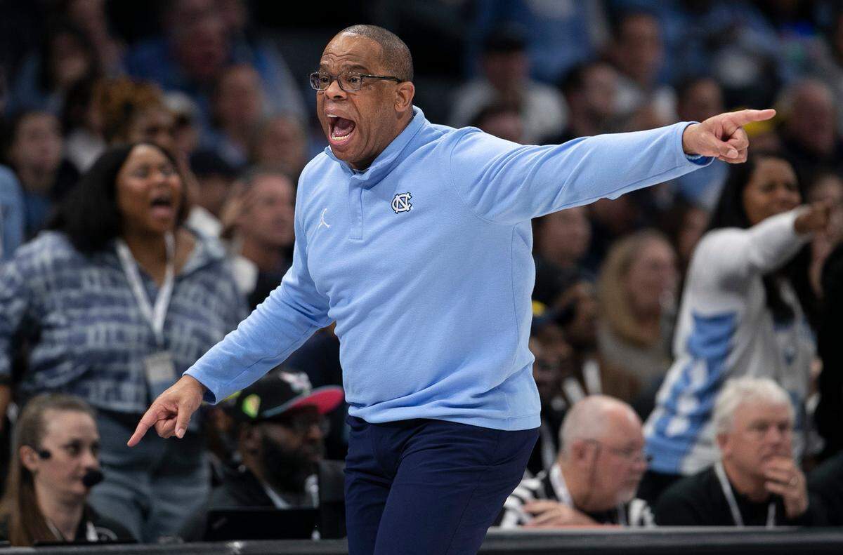 North Carolina coach Hubert Davis reacts after not getting a foul call against Michigan during the first on Wednesday, December 21, 2022 at the Spectrum Center in Charlotte, N.C.