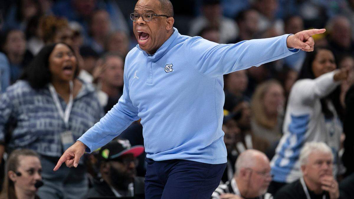 North Carolina coach Hubert Davis reacts after not getting a foul call against Michigan during the first half on Wednesday, December 21, 2022 at the Spectrum Center in Charlotte, N.C.