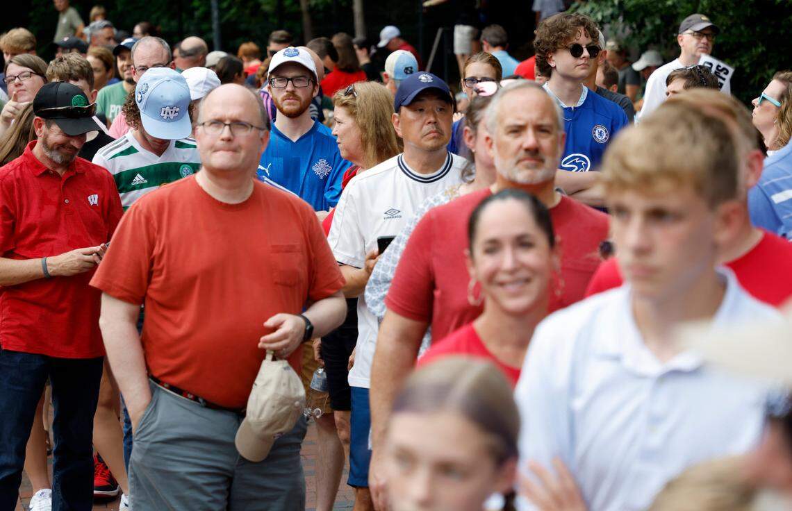 Fans line up to get into Kenan Stadium before Chelsea FC’s international friendly match against Wrexham FC in Chapel Hill, N.C., Wednesday, July 19, 2023.