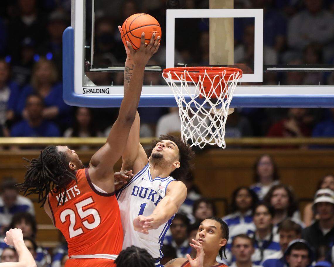 Duke’s Dereck Lively II blocks a shot by Virginia Tech’s Justyn Mutts during the second half of the Blue Devils’ 81-65 win over Virginia Tech on Saturday, Feb. 25, 2023, at Cameron Indoor Stadium in Durham, N.C.