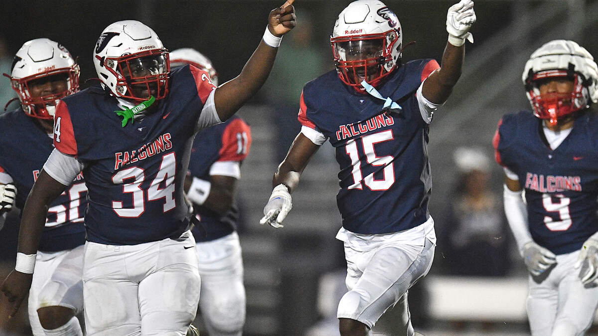 Jordan’s Talvin Johnson (34) and Lareun Wilson (15) react after the Smithfield-Selma fumble and turnover during the first half. The Durham Jordan Falcons and the Smithfield-Selma Spartans met in a football game in Durham, N.C. on September 13, 2024.