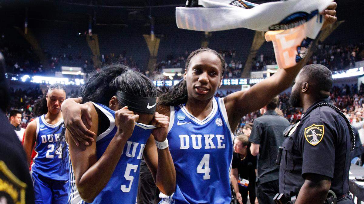 Duke’s Oluchi Okananwa and Jadyn Donovan walk off the court following the Blue Devils’ 54-50 loss to South Carolina in the NCAA Tournament Elite Eight at Legacy Arena on Sunday, March 30, 2025, in Birmingham, Ala.