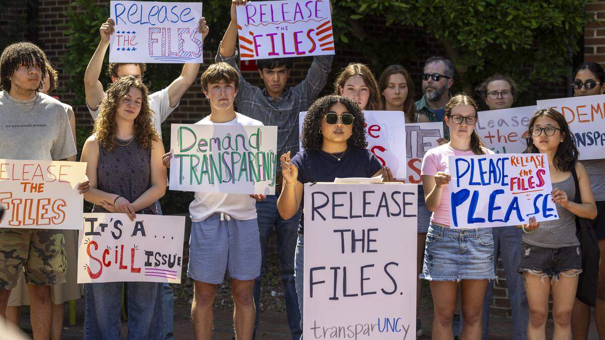 Kaveya Wertz, a UNC-Chapel Hill student and member of TransparUNCy, speaks during a press conference hosted by faculty and students Friday, April 17, 2026, outside Bank D. Kerr Hall on campus prior to a Faculty Council meeting. The group urges Chancellor Lee Roberts to release the $1.2 million SCiLL investigation, citing transparency, public records and campus accountability.