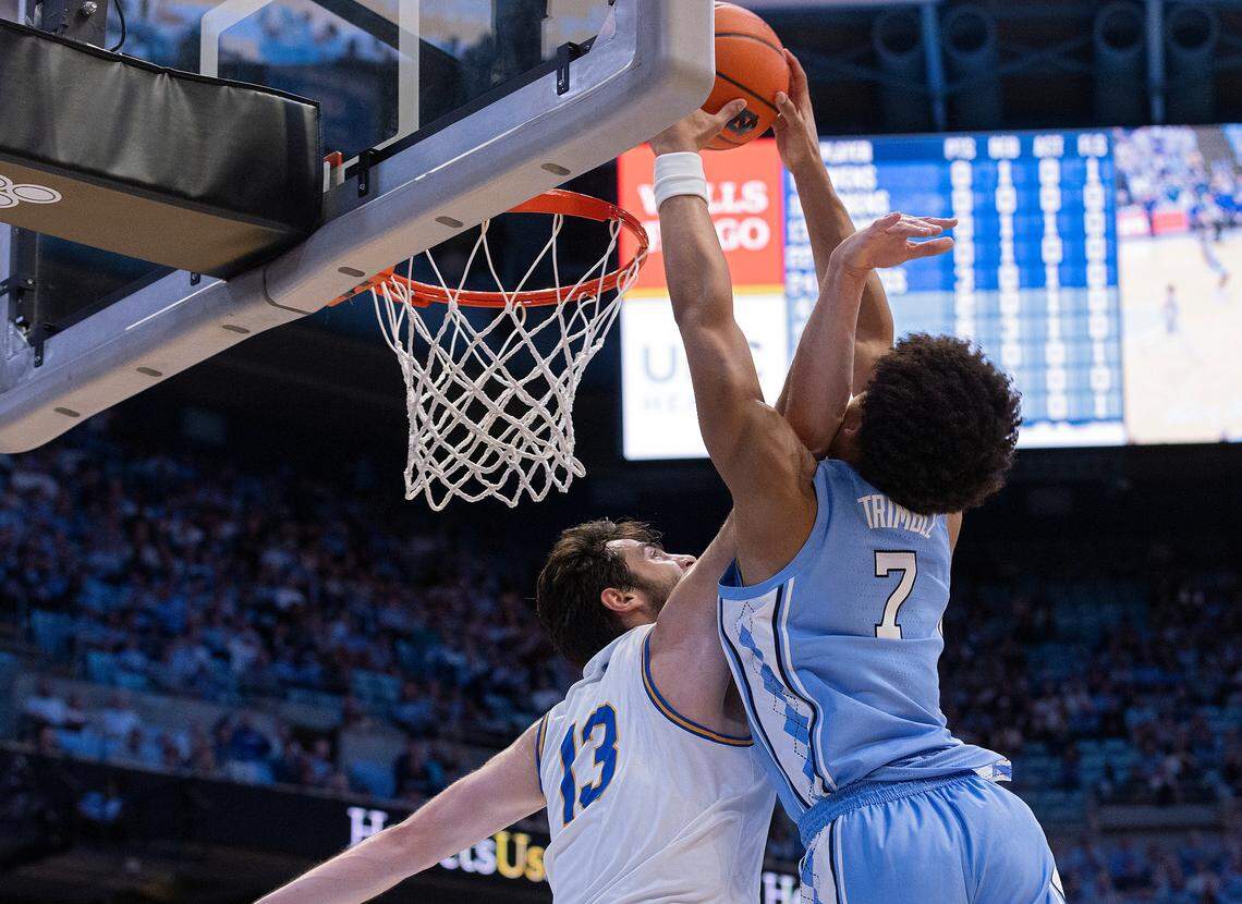 North Carolina’s Seth Trimble dunks over UC Riverside’s Vladimer Salaridze during the first half of the Tar Heels’ game on Friday, Nov. 17, 2023, at the Smith Center in Chapel Hill, N.C.