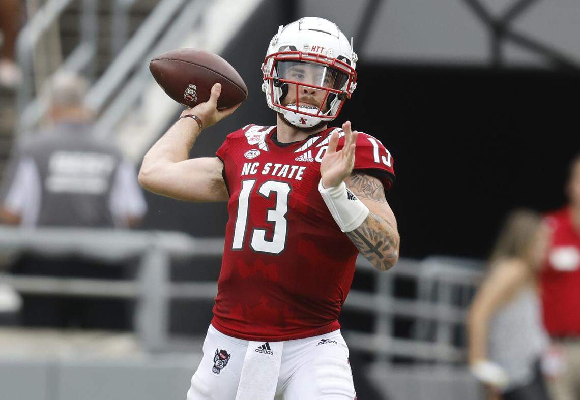 N.C. State quarterback Devin Leary (13) prepares to pass during the first half of N.C. State’s game against Charleston Southern at Carter-Finley Stadium in Raleigh, N.C., Saturday, Sept. 10, 2022.