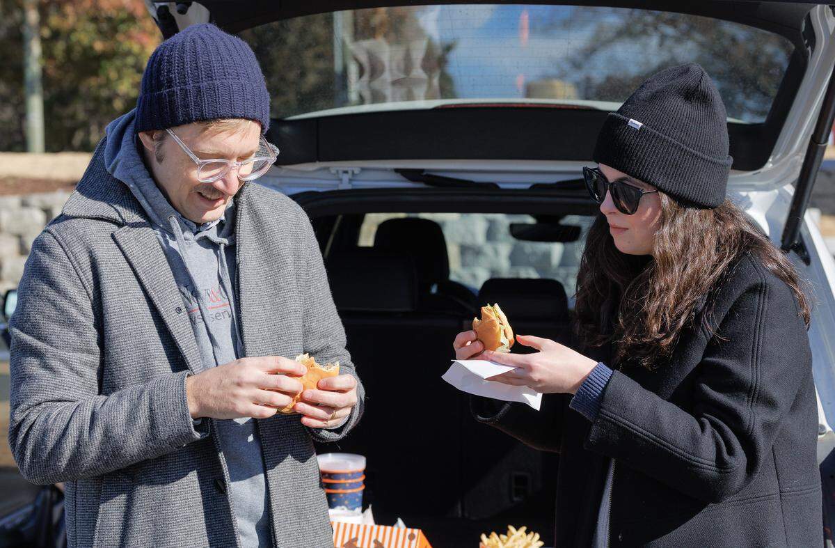 The News & Observer’s Drew Jackson and I, Renee Umsted, tasted a Whataburger, Spicy Chicken Sandwich, patty melt, fries, onion rings, Whatachick’n Strips and milkshakes outside the new Mebane Whataburger.