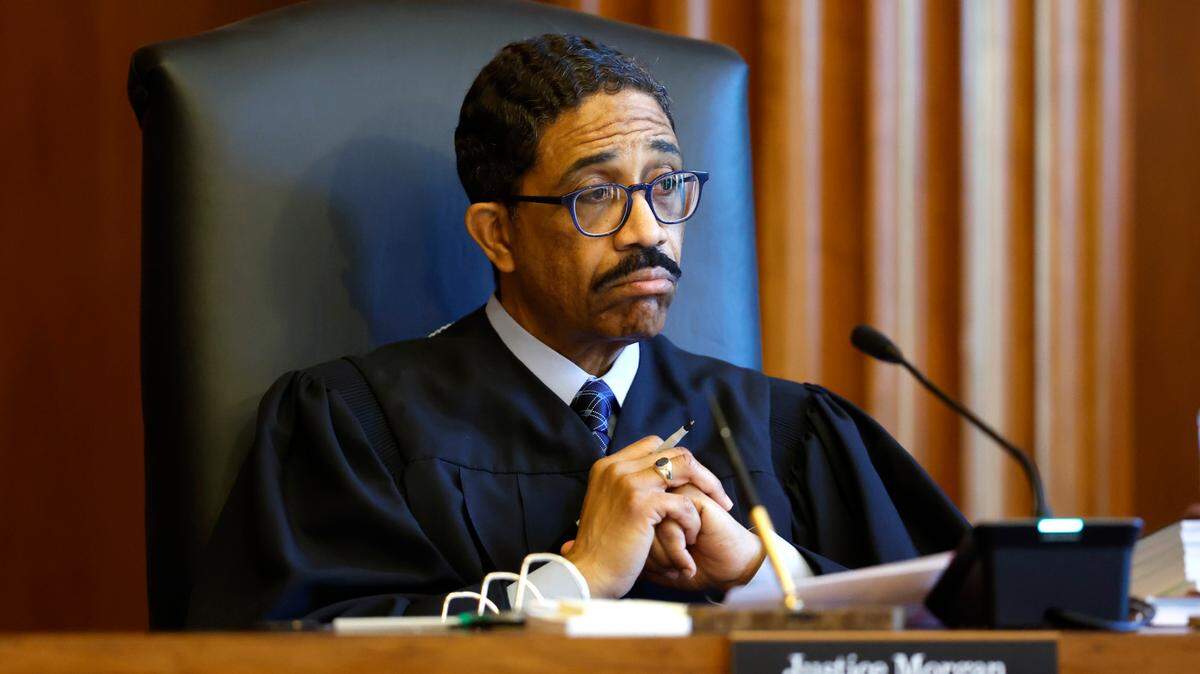 Associate Justice Michael Morgan listens during oral arguments at the Supreme Court of North Carolina in Raleigh, N.C., Monday, May 9, 2022.