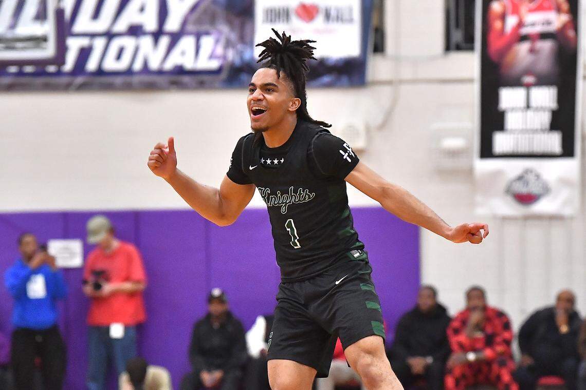 Greenfield's Donovan Dickens (1) reacts after making the three point shot against Coronado late in the second half. The Greenfield Knights and the Coronado Cougars (Nevada) met in the finals of the Day'Ron Sharpe bracket of the  John Wall Holiday Tournament in Raleigh, N.C. on December 30, 2025.