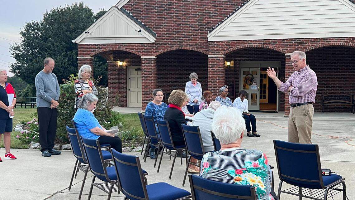 ‘Let our neighbors be loved.’ Sunday vigil unites grieving community through prayer