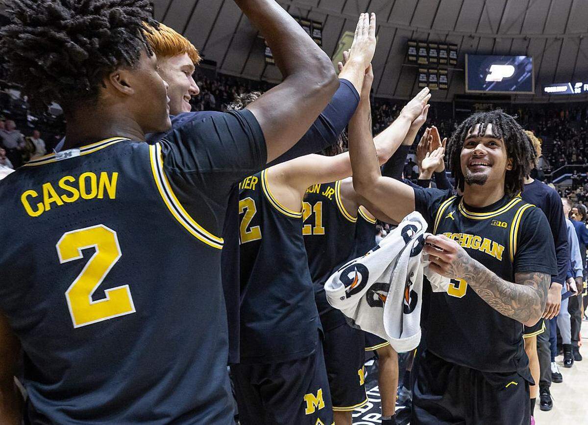 WEST LAFAYETTE, INDIANA - FEBRUARY 17: Elliot Cadeau #3 of the Michigan Wolverines celebrates with team members following the game against the Purdue Boilermakers at Mackey Arena on February 17, 2026 in West Lafayette, Indiana. (Photo by Michael Hickey/Getty Images)