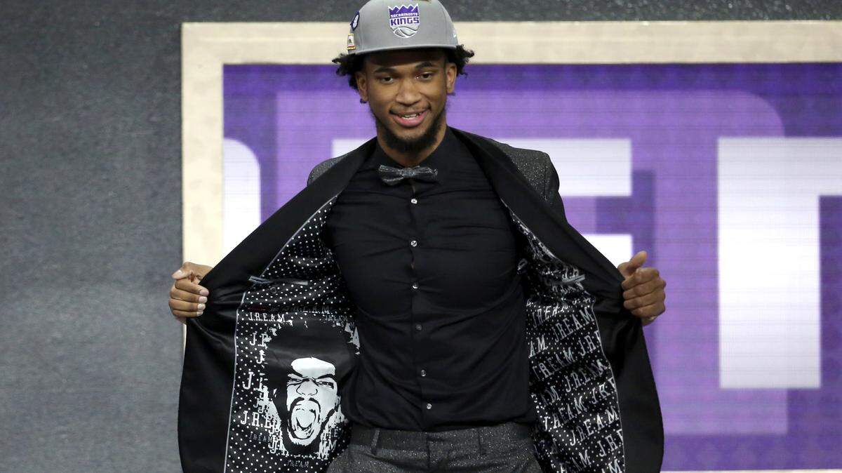 Duke's Marvin Bagley III poses for a picture after he was picked second overall by the Sacramento Kings during the NBA basketball draft in New York, Thursday, June 21, 2018.
